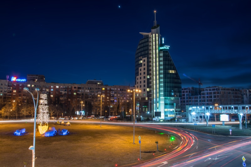 skyscraper, burgas, building exterior, vacation, financial district, road, summer, motion, time, architecture, city, photo, sea, nature, 5K, evening, urban