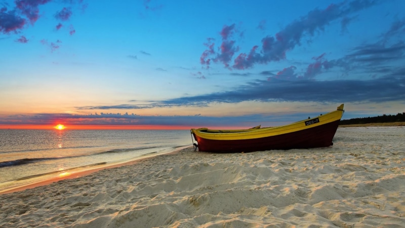 mode of transportation, fishing boat, boat, nautical vessel, coast, horizon, land, sky, sand, moored, landscape, waves, cloud - sky, sunset, horizon over water