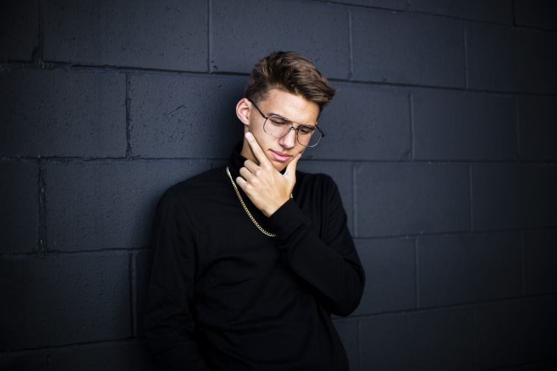 males, chin, one Man Only, one Person, fashion, shirt, portrait, eyeglasses, only men, young Adult, hand, wall, looking, looking away, leisure activity