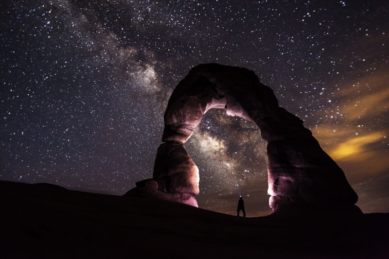 star - space, person, universe, galaxy, silhouette, stars, long-exposure, purple, arch, arches national park, scenic, geology, star field, utah, low angle shot