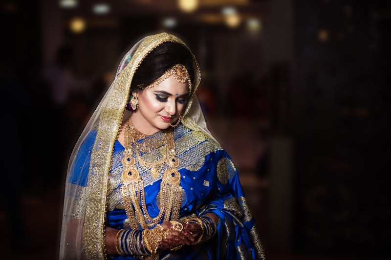 focus on foreground, woman, standing, looking, hairstyle, portrait, front view, costume, attractive, adult, blue, person, beauty, one person, saree, dress
