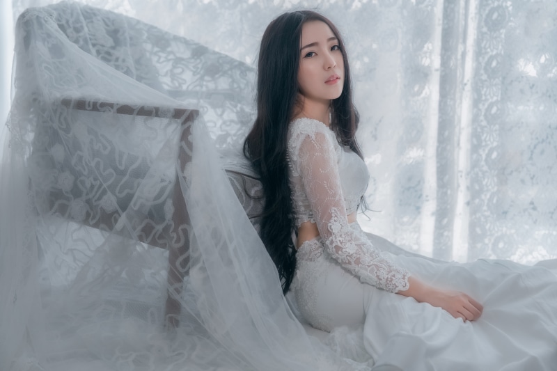 furniture, long-haired, sad, window, face, light background, young, sitting, girl, the bride, lace, hem, fabric, tulle, portrait, 5K, pose, beauty, sideways