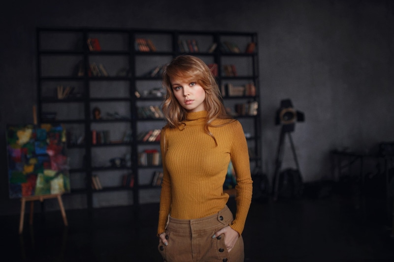 one person, sleeved, women, painted nails, adult, contemplation, yellow sweater, long hair, casual clothing, shirt, standing, model, s, portrait, hair