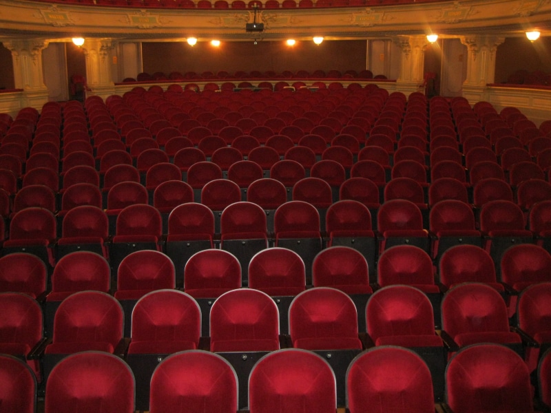 performance, empty, audience, arts culture and entertainment, indoors, red, theater, stage, no people, chair, opportunity, auditorium, repetition, illuminated