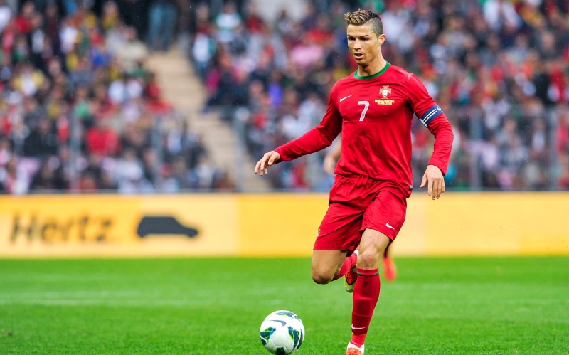 Football player, audience, spectator, ball, sports team, soccer ball, incidental people, athlete, playing, Cristiano Ronaldo, 2K, sport, team sport, soccer team