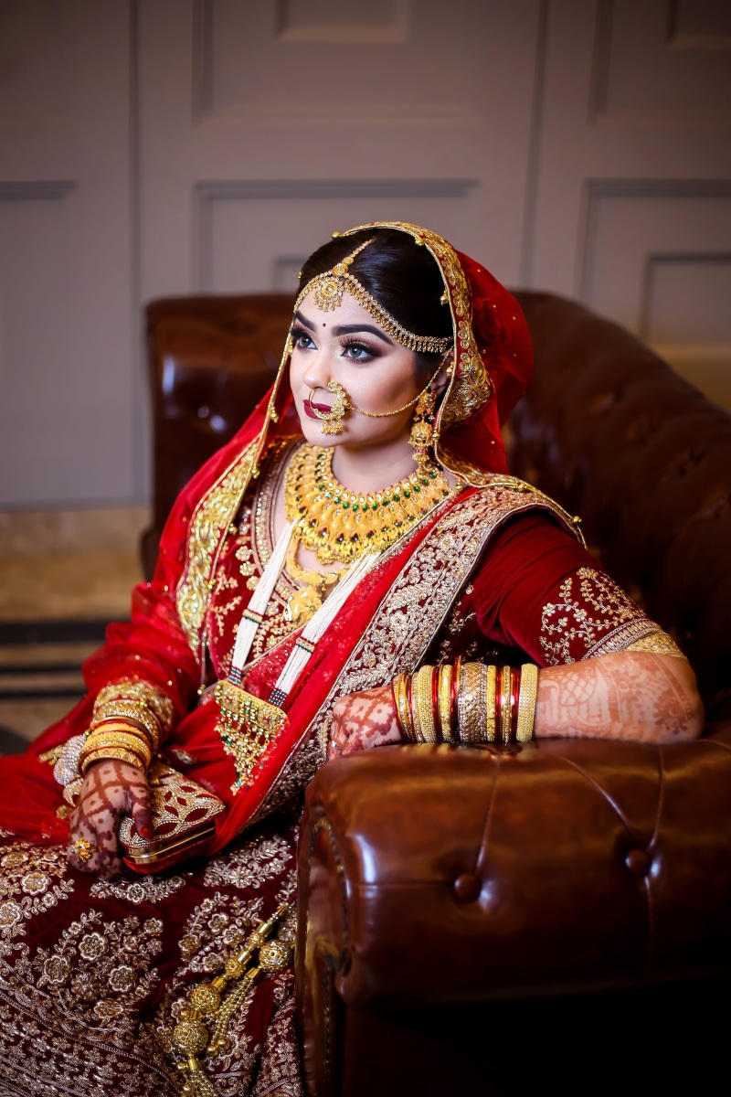 elegant, female, sitting, sofa, sari, person, beautiful, women, real people, 5K, traditional wear, make-up, dress, one person, young adult, lady, religion