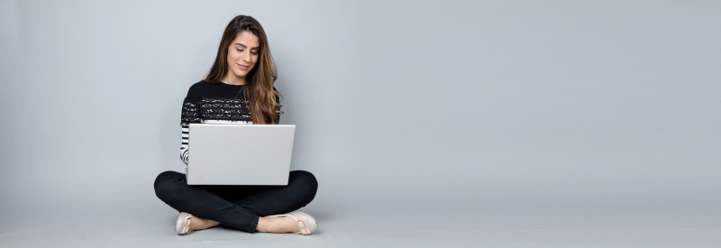 hair, indoors, computer, beautiful woman, female, casual, banner, adult, working, communication, read, young, long hair, blogger, online, internet, reading