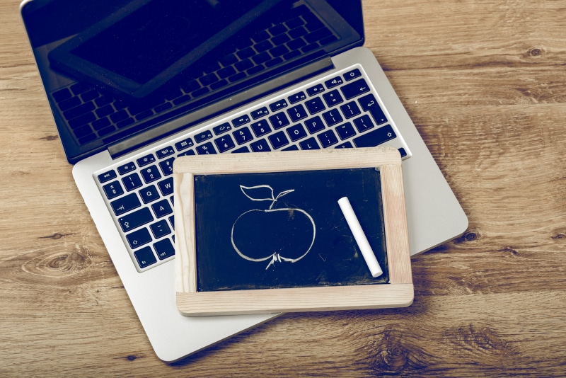 pro, indoors, blue, technology, high angle view, publication, MacBook Pro, wireless technology, internet, portable information device, still life, paper