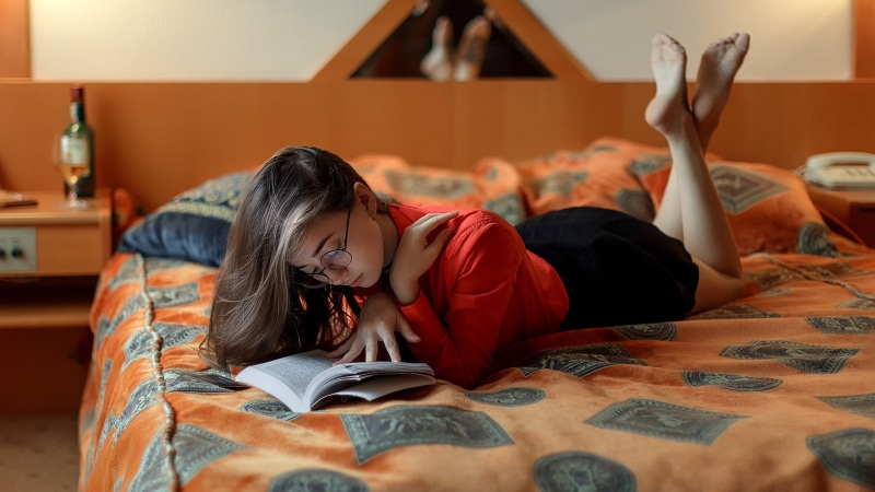 women, bedroom, 1080P, lifestyles, domestic life, beautiful woman, in bed, arms raised, relaxation, focus on foreground, portrait, glasses, bed, indoors