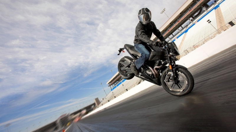 transportation, blurred motion, speed, motorcycle, nature, day, black, men, bike, road, cloud - sky, mode of transportation, riding, low angle view, bikes
