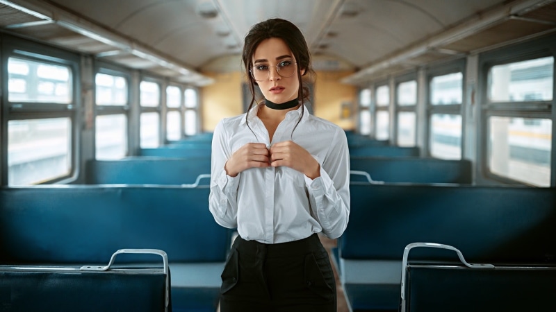 business person, clothing, one person, young adult, front view, looking at camera, white, women, s, window, transportation, women with glasses, shirt, choker