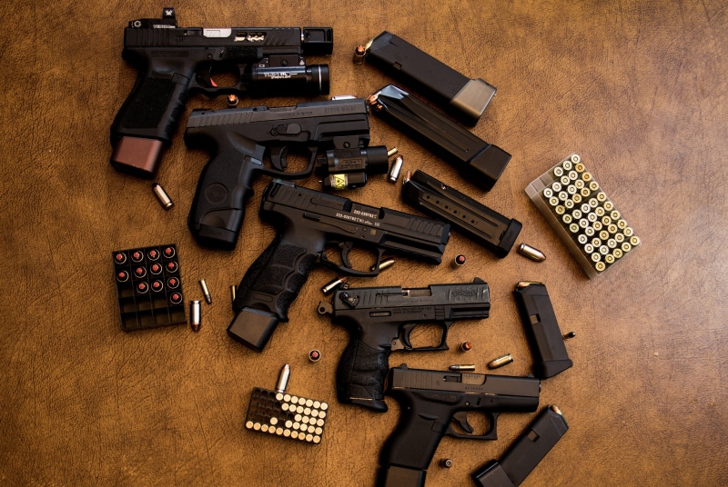 9mm, rifle, guns, ammo, security, weapon, directly above, variation, sign, colored background, weapons, table, firearm, protection, crime, collection, high angle view