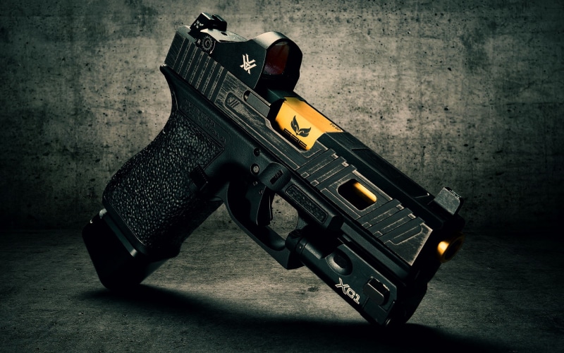 aggression, loading, machine gun, black, sign, protection, gun, glock, retro styled, still life, hand, violence, crime, warning sign, indoors, social issues