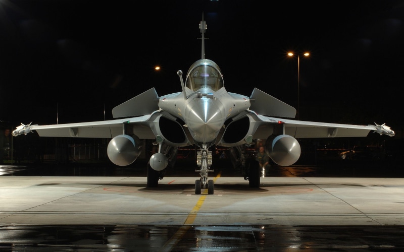building exterior, nature, sky, fighter plane, built structure, outdoors, surveillance, runway, aerospace industry, Dassault Rafale, military, travel, no people