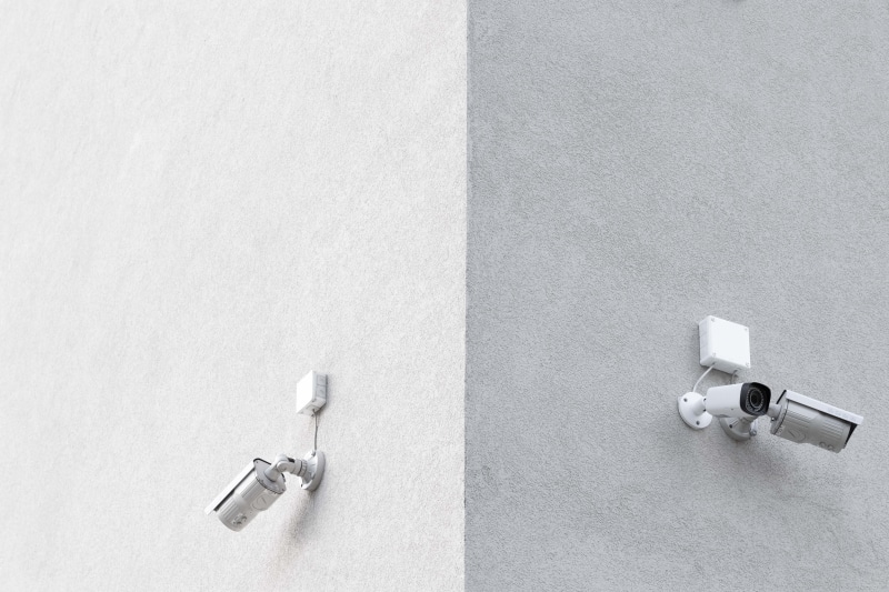architecture, built structure, indoors, technology, building, day, cctv, chrome, still life, camera, white color, wall - building feature, silver colored