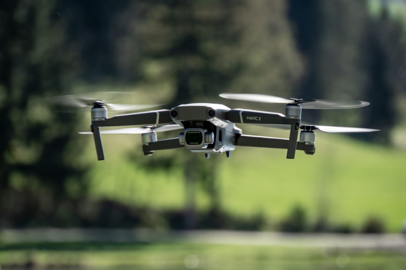 mode of transportation, photo, helicopter, gun, technology, selective focus, 5K, blur, mavic pro, focus on foreground, airplane, sunlight, vehicle, selective