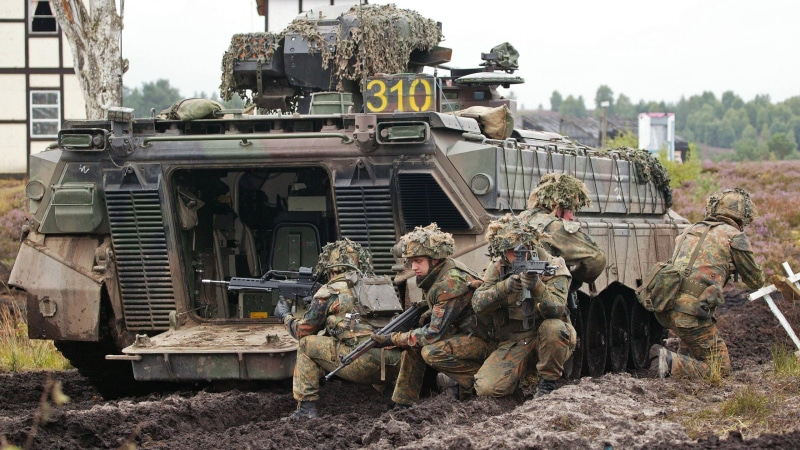 transportation, outdoors, incidental people, army, built structure, machinery, camouflage clothing, armored tank, Bundeswehr, demolished, infantry fighting vehicle