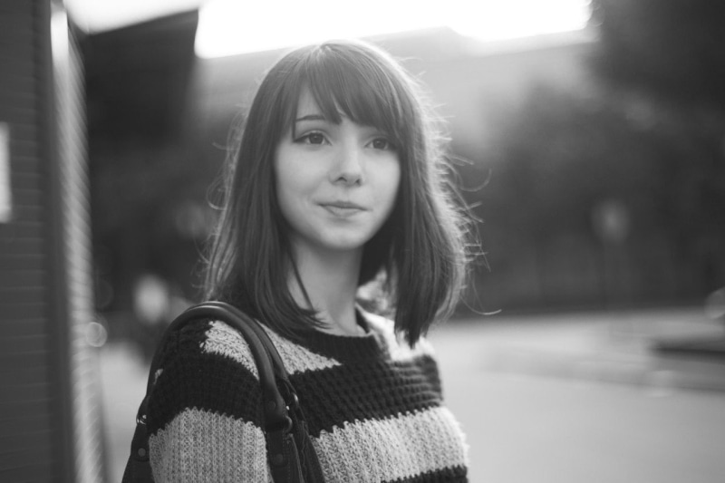 women katya lischina monochrome, clothing, contemplation, women, casual clothing, focus on foreground, medium-length hair, sweater, standing, beautiful woman