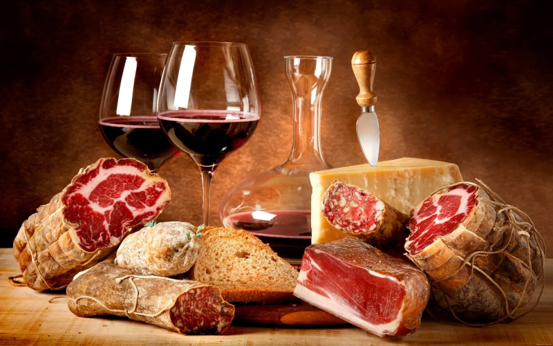 cheese, wineglass, no people, tray, food, slice, studio shot, meats, refreshment, meat, french food, red wine, luxury, fruit, indoors, healthy eating, dairy product