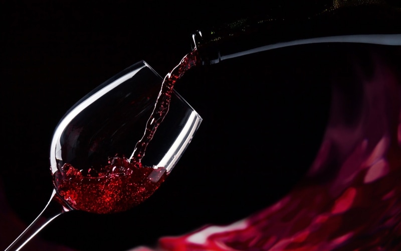 Wine, studio shot, food and drink, glass - material, wineglass, refreshment, no people, red wine, black background, glass, kitchen utensil, red, household equipment