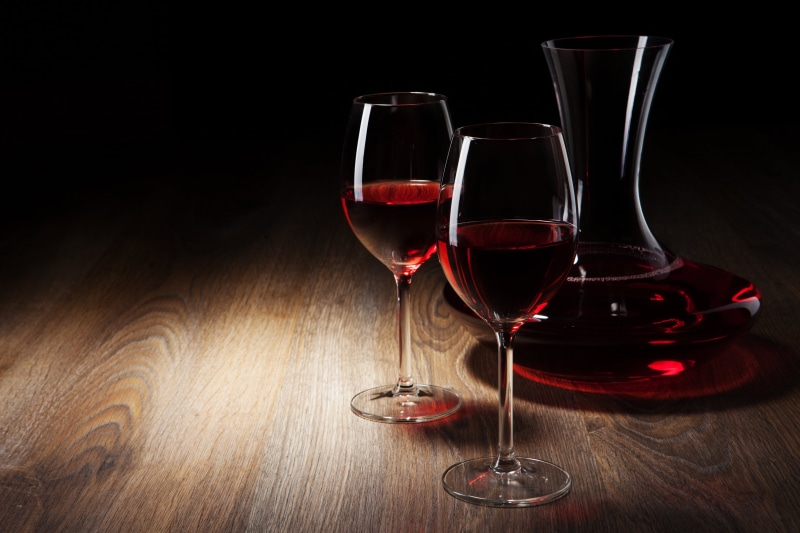 food, celebration, glass - Material, indoors, glass, restaurant, drink, wineglass, long, black background, cabernet Sauvignon Grape, red, drinking Glass