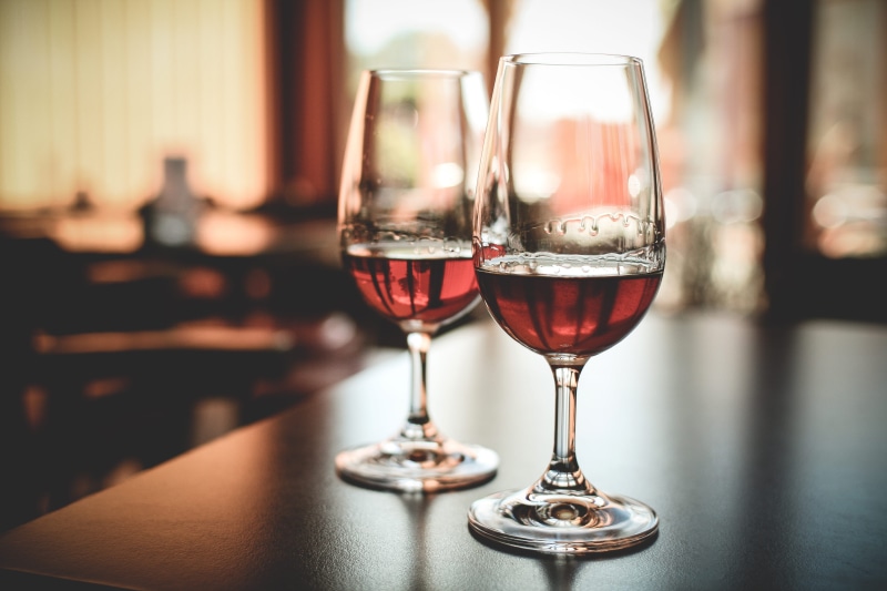 focus on foreground, household equipment, drinking, two, red Wine, freshness, rum, drinking Glass, refreshment, glass - Material, wine, elegance, table