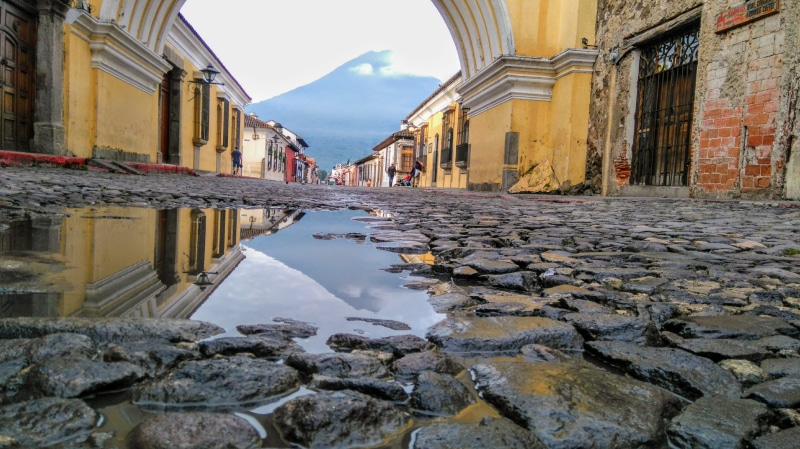 building, water, pavement, sunrise, mountain, town, city, residential district, building exterior, canal, antigua guatemala, street, 4K, architecture