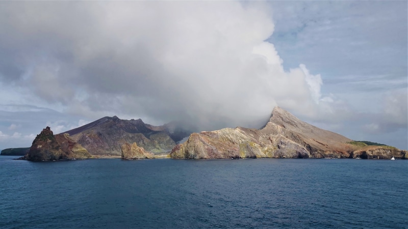 rock formation, tranquility, waterfront, mountain, marine volcano, no people, nature, volcano, outdoors, active volcano, non-urban scene, formation, bay of plenty
