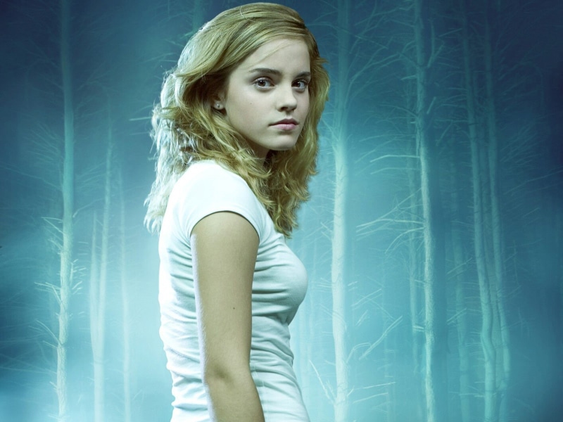 blue background, studio shot, beautiful woman, contemplation, hairstyle, 720P, blond hair, waist up, Harry Potter, long hair, three quarter length, standing