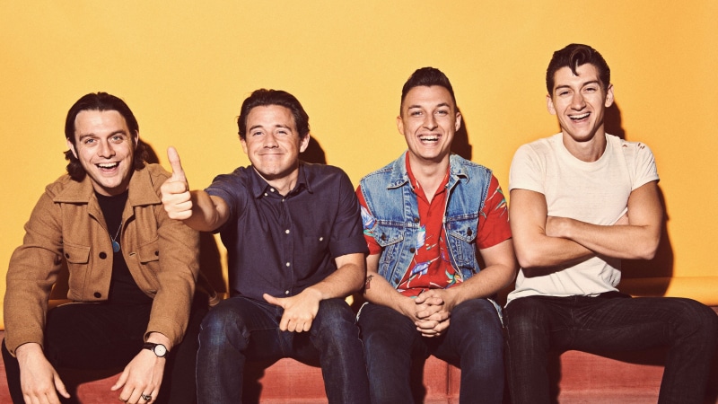 young adult, casual clothing, smiling, males, emotion, happiness, indoors, friendship, looking at camera, front view, 2K, Arctic Monkeys, togetherness