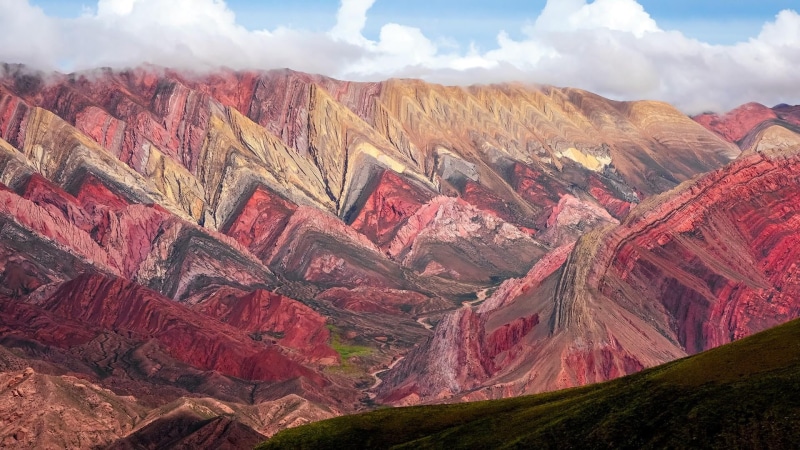 travel, environment, mountain peak, cerro de los 14 colores, beauty in nature, cloud - sky, eroded, no people, purmamarca, rainbow mountain, geology, outdoors