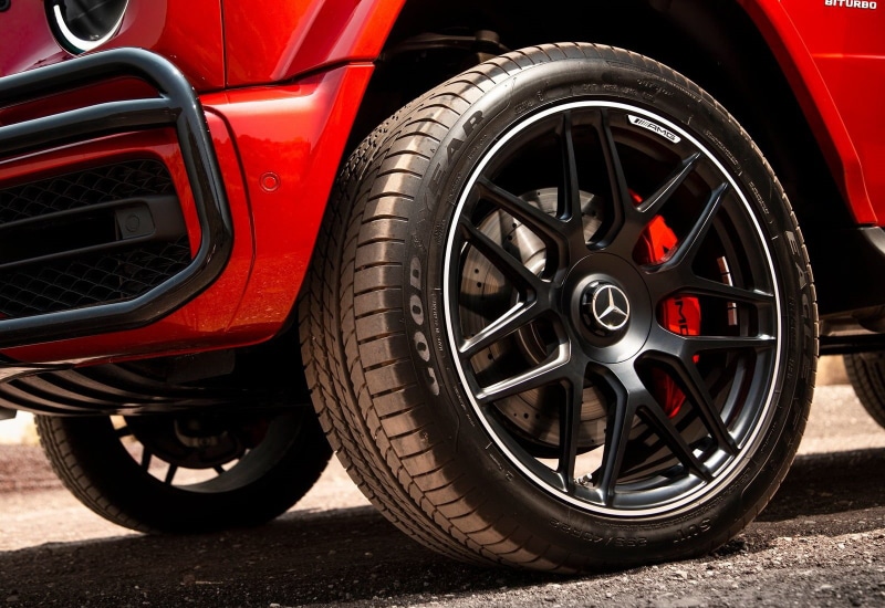 black color, tire, red, vehicle part, metal, wheel, chrome, car, shiny, mode of transportation, transportation, g63, silver colored, close-up, no people