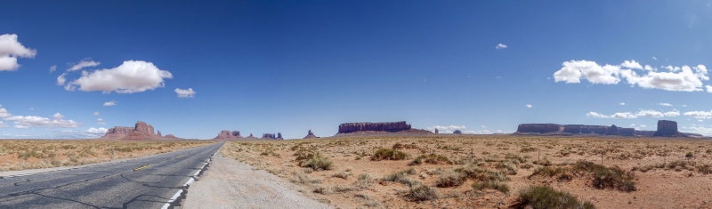 urban skyline, environment, land, travel destinations, outdoors, transportation, solid, scenics - nature, sky, desert, rock, cloud - sky, blue, road, travel