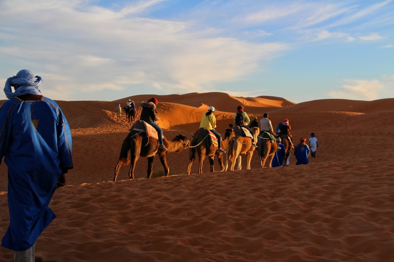 sand Dune, people, riding, walking, fun, group of people, convoy, pets, landscape, trip, dromedary Camel, camel caravan, animal themes, domestic, travelling