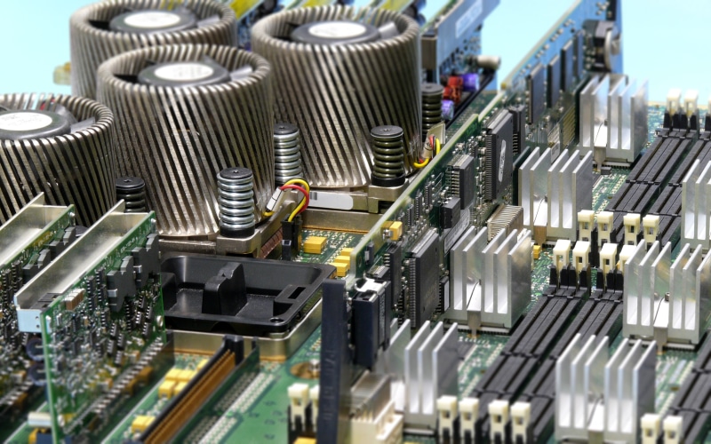complexity, machinery, computer part, no people, computer, high angle view, indoors, grey, motherboards, circuit, electrical equipment, backgrounds, equipment