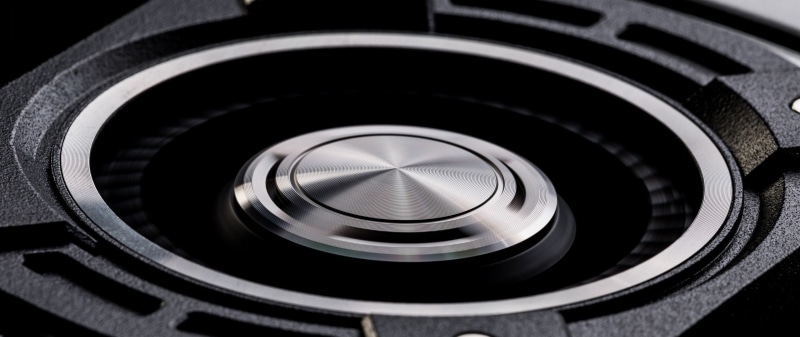 silver colored, glass - material, x, reflection, black color, extreme close-up, single object, space, arts culture and entertainment, circle, black background