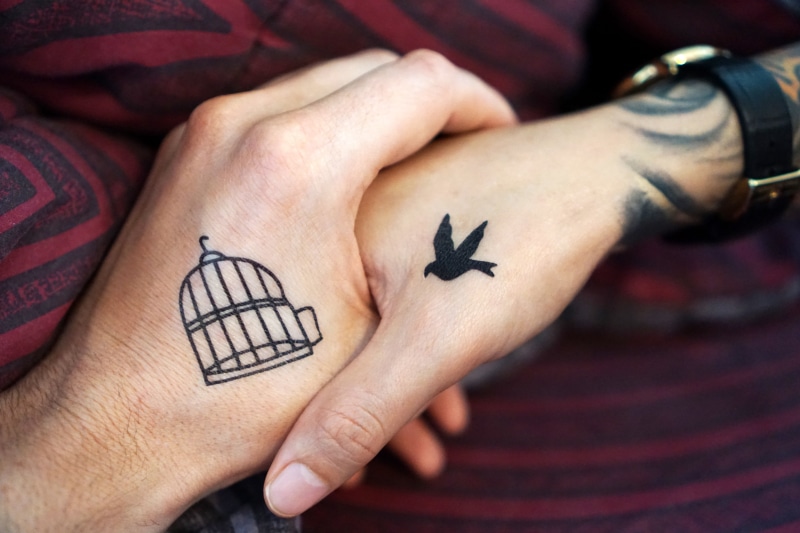 close-up, human Finger, indoors, bird, tattoos, women, human limb, one person, symbol, tattoo, men, creativity, 5K, communication, birdcage, body part