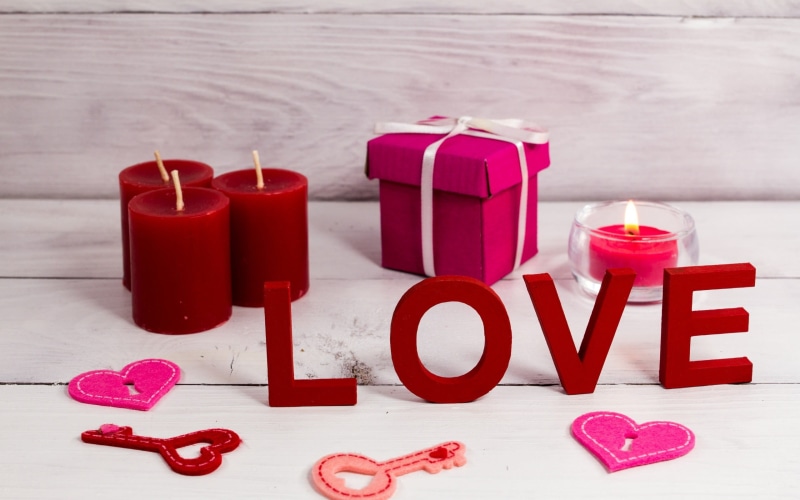 white, capital letter, 2K, burning, fire, emotion, pink, western script, candle, container, no people, heart, still life, flame, group of objects, close-up