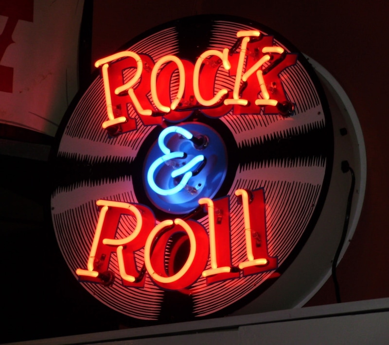 indoors, number, circle, no people, 720P, text, light, rock, signage, close-up, red, neon, glowing, fuel and power generation, geometric shape, sign, shape