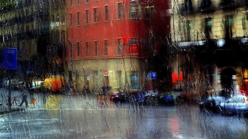 built structure, no people, urban area, window, building, road, glass, illuminated, rainy day, glass - material, reflection, outdoors, rainy weather, blur