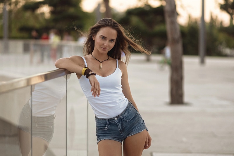 portrait, jean shorts, women, looking at viewer, windy, white tops, tight shorts, women outdoors, wind, model, bare shoulders, Galyaev Evgeniy, 1080P