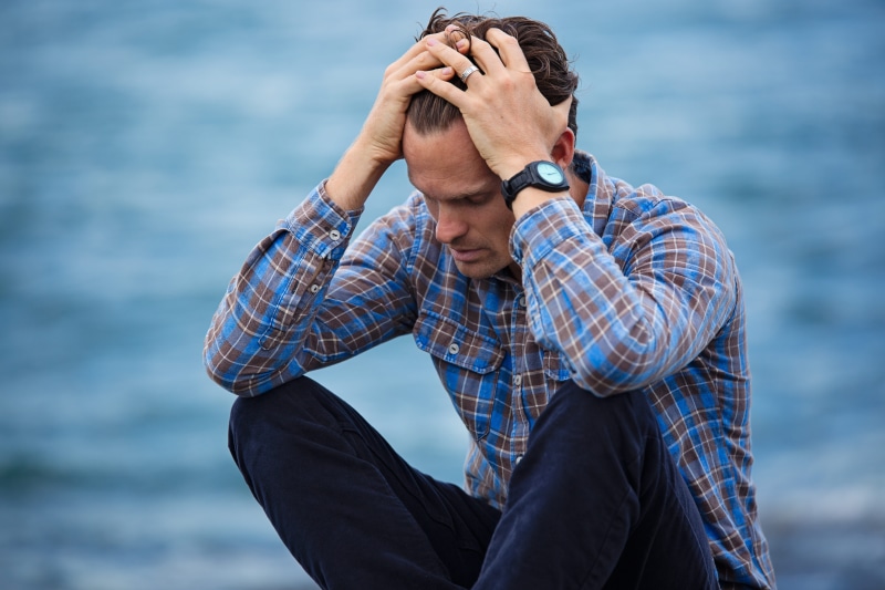 fear, focus on foreground, scared, blue, hair, touching, worry, stressed, real people, one person, brown, anxious, sea, pain, head in hands, sad, leisure activity