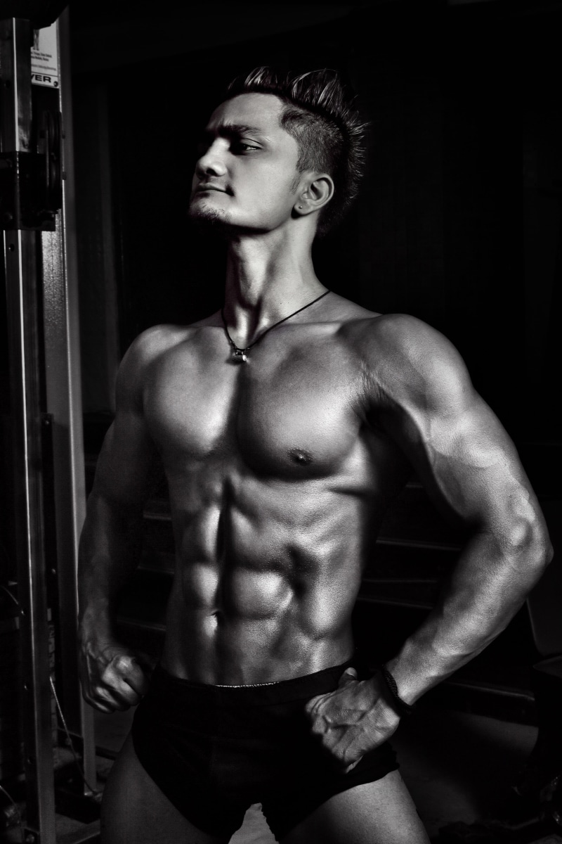 indoors, brawny, muscles, sports training, black-and-white, biceps, standiung, masculinity, workout, wellbeing, muscular build, one person, exercising