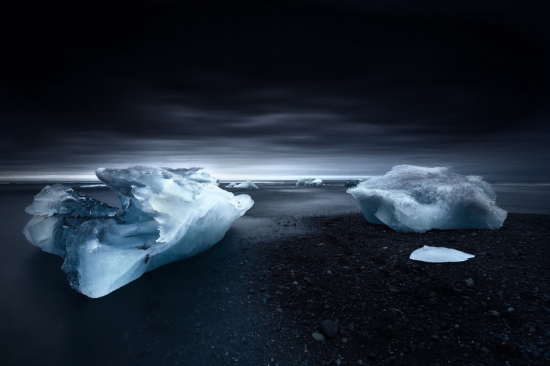 environment, cold temperature, melting, nature, figurine, water, winter, landscape, white, sky, sea, outdoors, beauty in nature, lagoon, ceramic, black