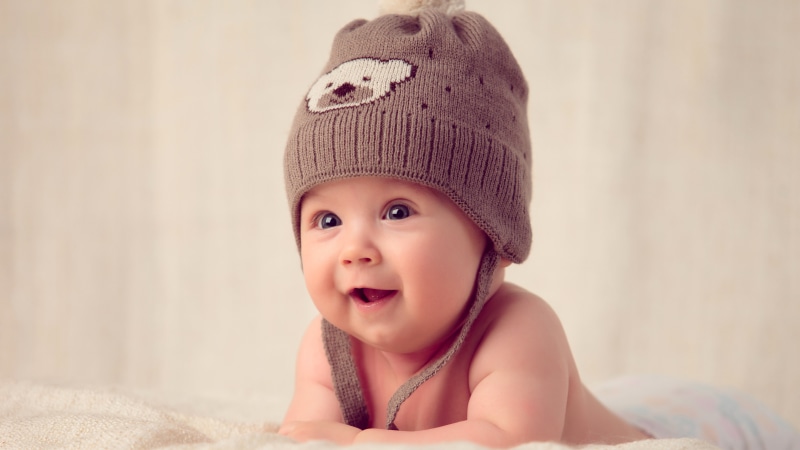 real people, emotion, indoors, portrait, Muffle Cap, childhood, headshot, happiness, mouth open, Cute Baby, smiling, babyhood, child, Hat, young, clothing