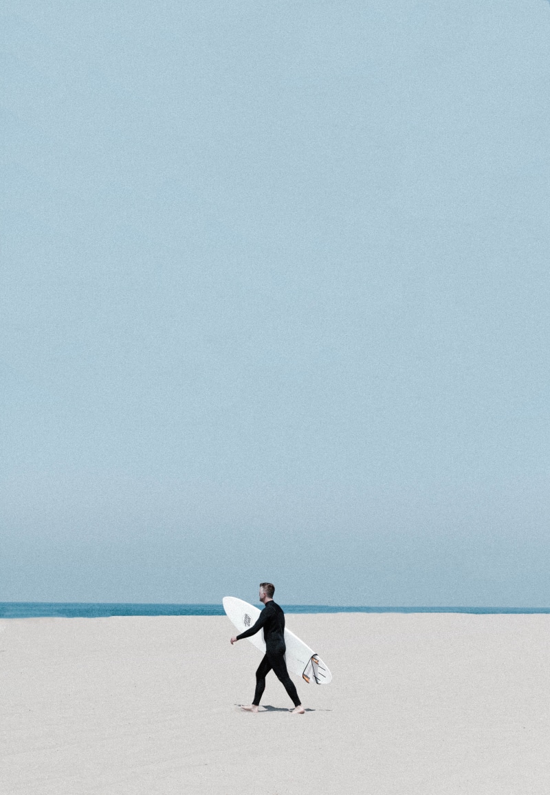 natural Phenomenon, color Image, beach, moving Activity, physical Activity, image Technique, surfboard, men, adult, image Type, day, white, holding, art and Craft Product