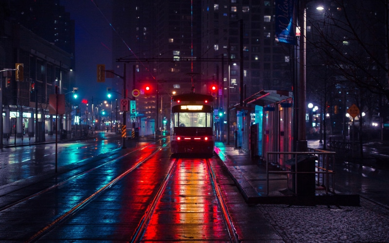 street, red, city, red light, rainy, no people, light, lighting equipment, tram, outdoors, motion, transportation, city life, building exterior, land vehicle