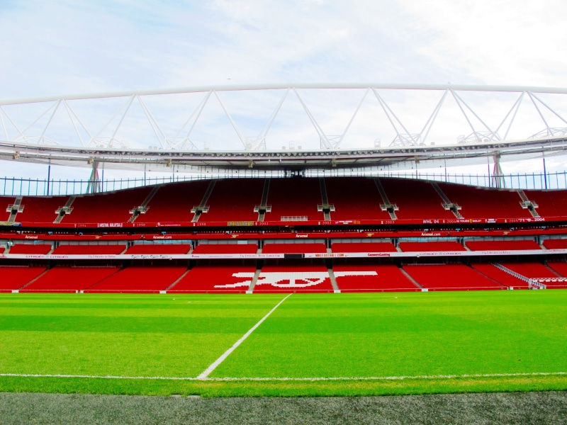 2K, outdoors, soccer field, sky, arsenal, plant, playing field, pitch, seat, sport, cloudy, built structure, grass, nature, bleachers, team sport, football
