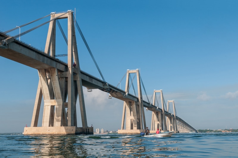 sky, general rafael urdaneta, waterfront, concrete, hero, viaduct, mode of transportation, clear sky, span, outdoors, cloudy, bridge, engineering, gray