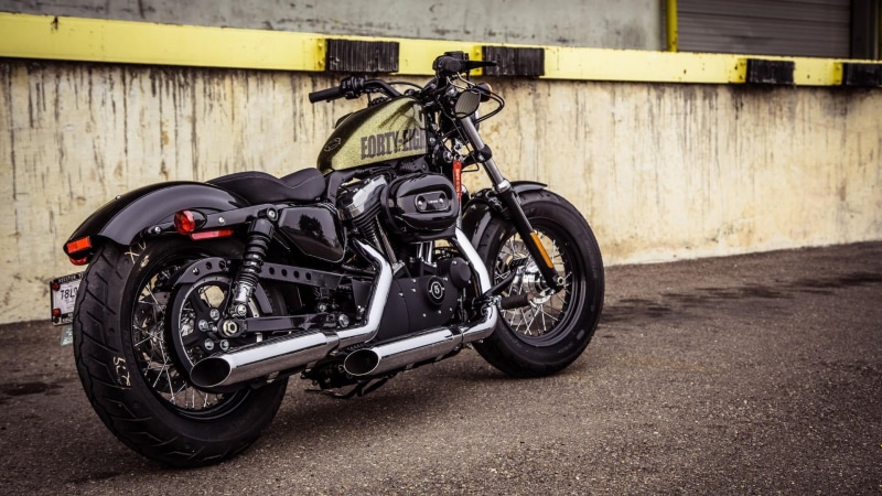 parking, bicycle, city, street, stationary, side view, travel, harley davidson, retro styled, black color, motor vehicle, sign, architecture, harley davidson sportster